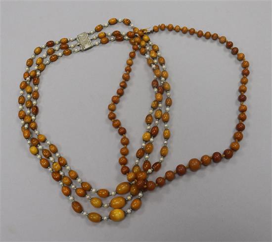 Two amber bead necklaces.